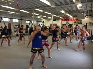 Master Suchart taking a group through the physical practice of traditional Muay Thai